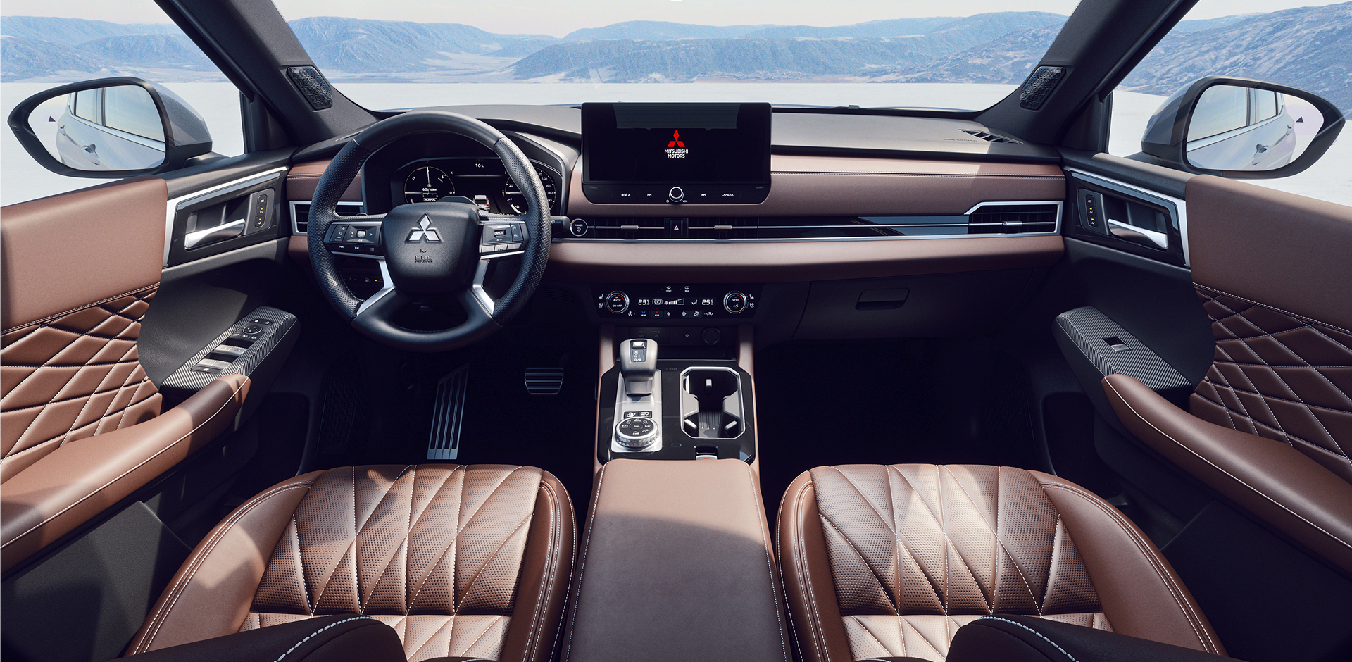 Eine Person bedient das große Touchdisplay eines modernen Autos während der Fahrt und hält mit der anderen Hand das Lenkrad.